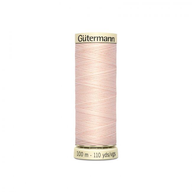 Univerzálna šijacia niť Gütermann v béžovej farbe s nádychom ružovej 210
