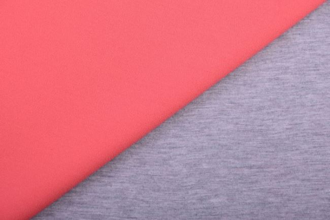 Obojstranná kostýmová látka v kombinácii lososovej farby a svetlo šedého melíru 12535/536