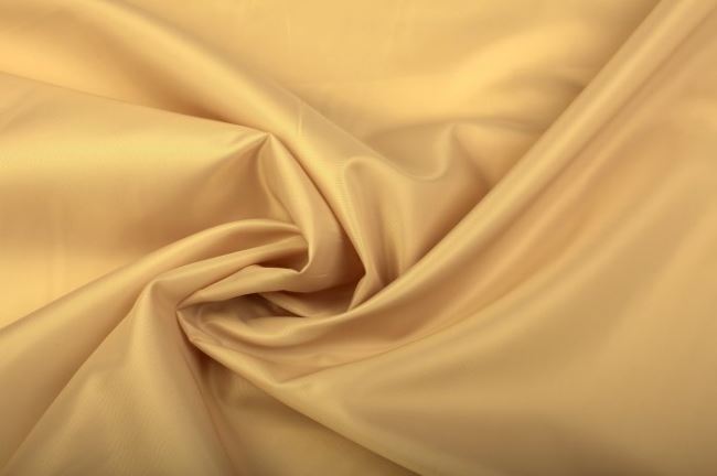 Polyesterová podšívka v zlatistej farbe 0160/592