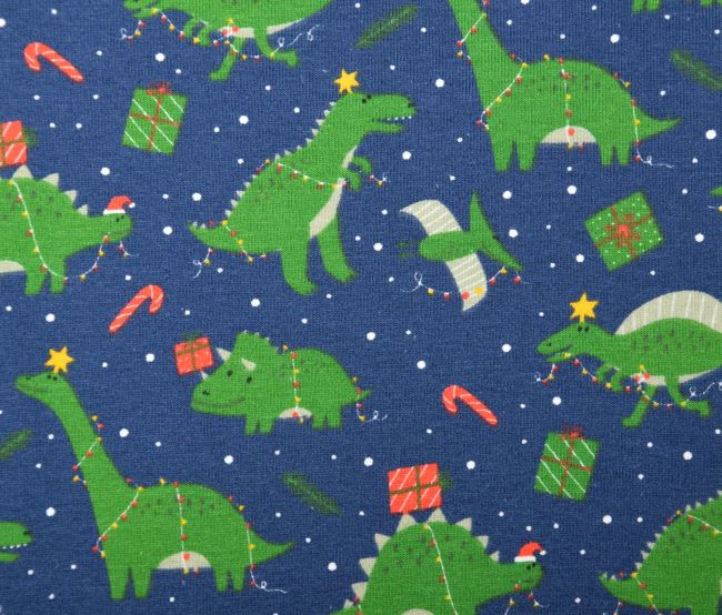 Vianočný bavlnený úplet v modrej farbe s potlačou dinosaurov 18739/008