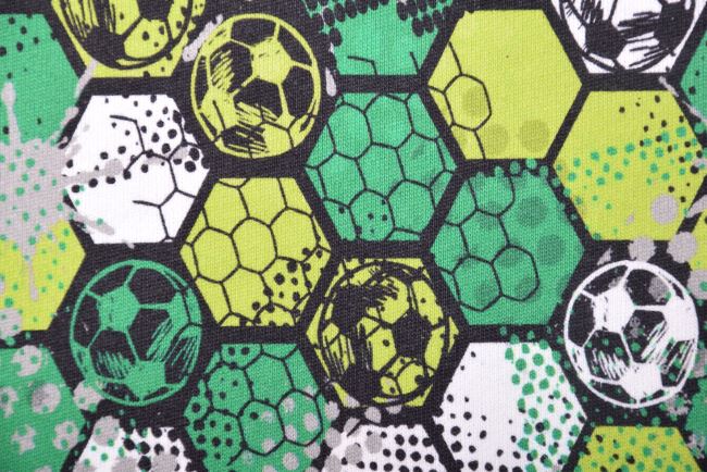 Počesaná teplákovina v zelenej farbe s digitálnou potlačou futbalových lôpt 19356/025